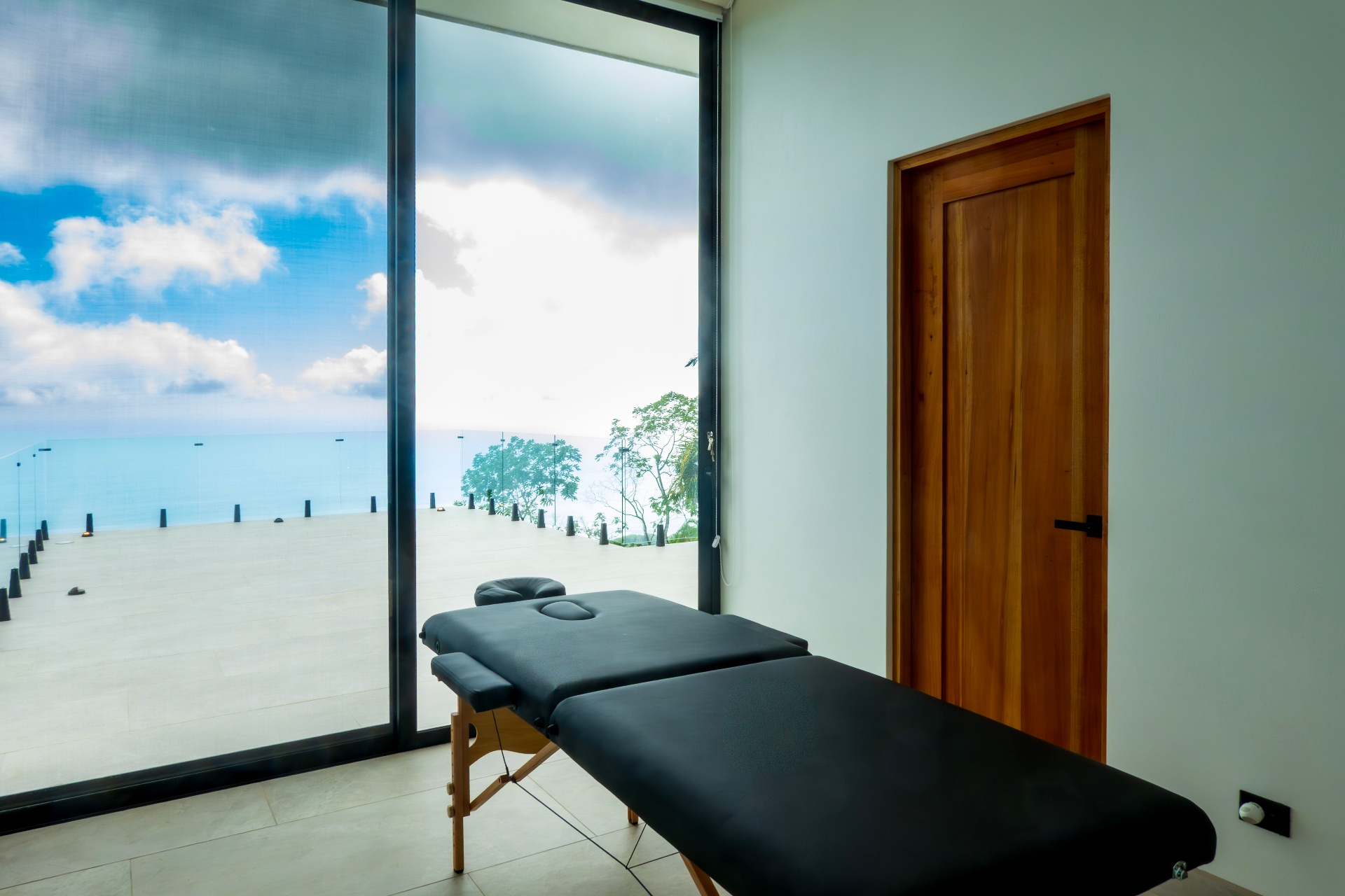 In-villa massage table with ocean view at Casa Cascada