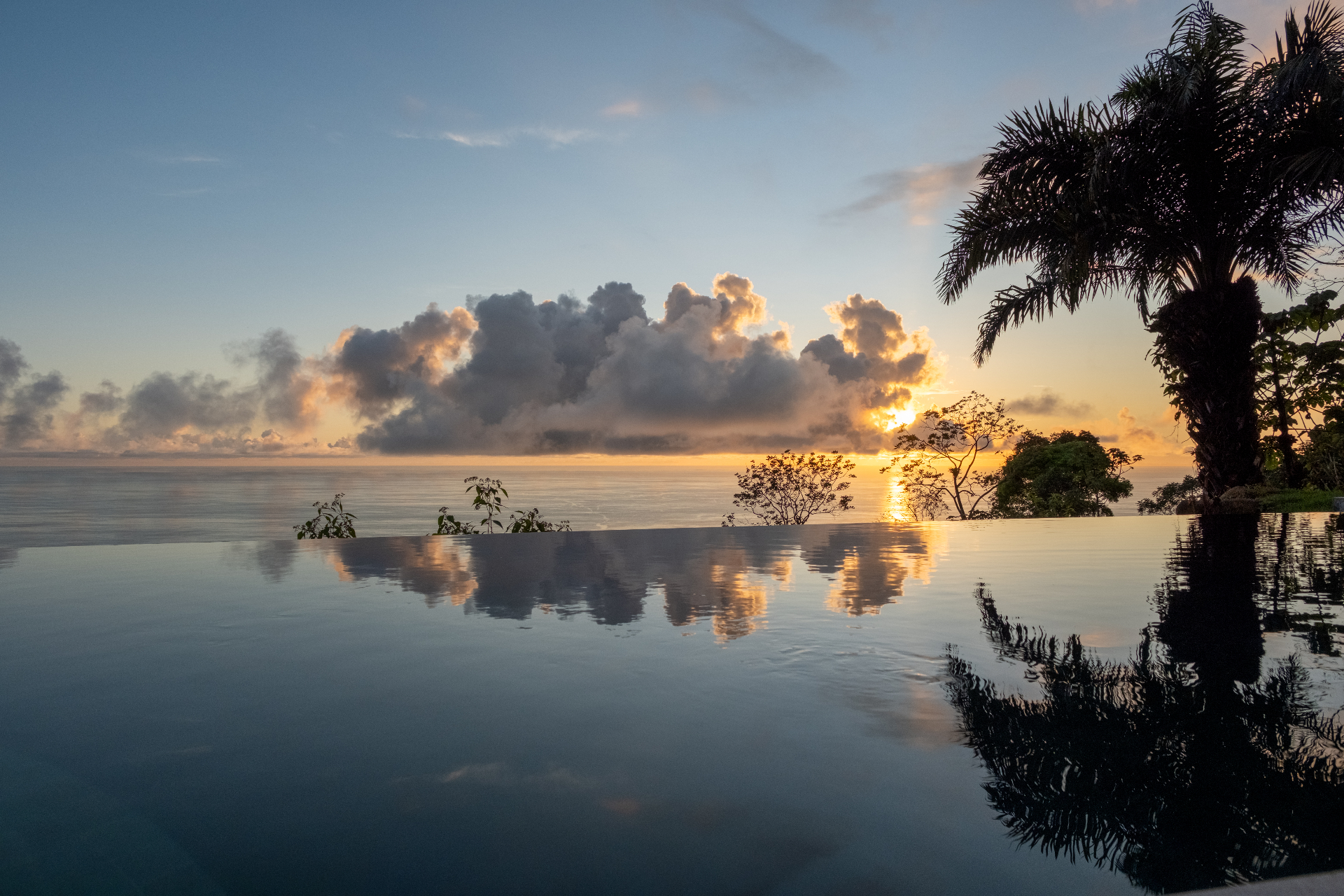 Infinity pool merging with the Pacific Ocean horizon
